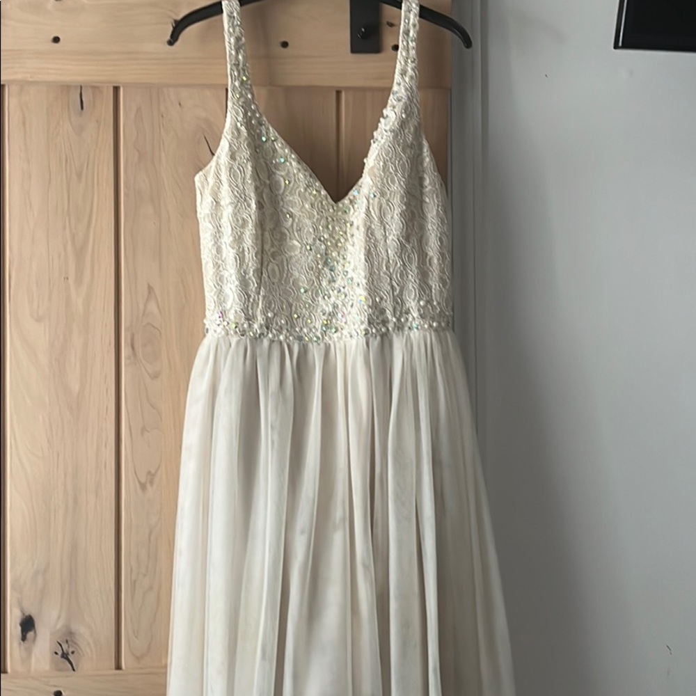 Cream long dress with pearls and rhinestones
